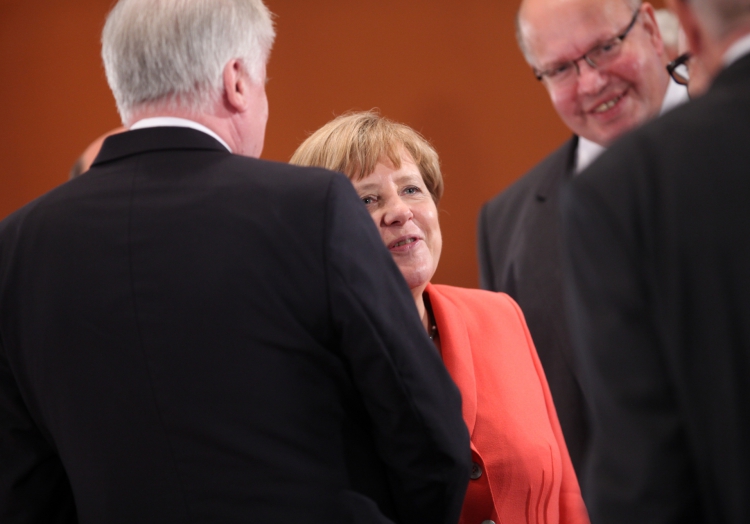 Horst Seehofer, Angela Merkel und Peter Altmaier, über dts Nachrichtenagentur