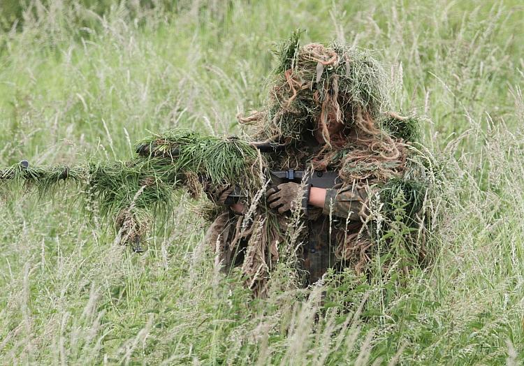 Getarnter Soldat (Archiv), via dts Nachrichtenagentur