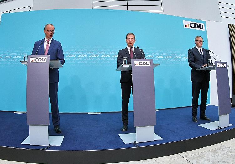 Friedrich Merz, Michael Kretschmer, Mario Voigt am 02.09.2024, via dts Nachrichtenagentur